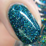 Tinsel Kiss – a deep green jelly base with super holographic silver microglitter