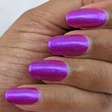 Infinite force is a stunning Aurora shimmer in a vibrant pink/purple