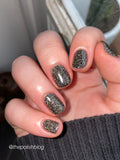 I Believe - a black jelly base this polish is full of silver holo reflective glitter and gold super holographic glitter