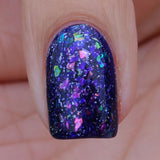 Eve Magic – an indigo jelly with crystal colour shifting flakes in pink/violet/green/gold and holo flakes