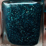 Evergreen Envy – a jelly teal coloured base with a smattering of holo flakes