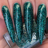 Tinsel Kiss – a deep green jelly base with super holographic silver microglitter