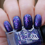 Eve Magic – an indigo jelly with crystal colour shifting flakes in pink/violet/green/gold and holo flakes