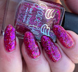 Cherish - Mother’s Day  A deep pink jelly base with fuchsia shred/flakes and silver holo micro flakes.