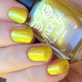 Who is She? -Aurora shimmer makes this polish a really strong pretty yellow polish. It even moves to green in low lights.