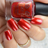 9 ¾  a orange toned red with red and gold aurora shimmer with metallic look and gold flecks