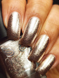 Moonface – a champagne coloured metallic flakie polish